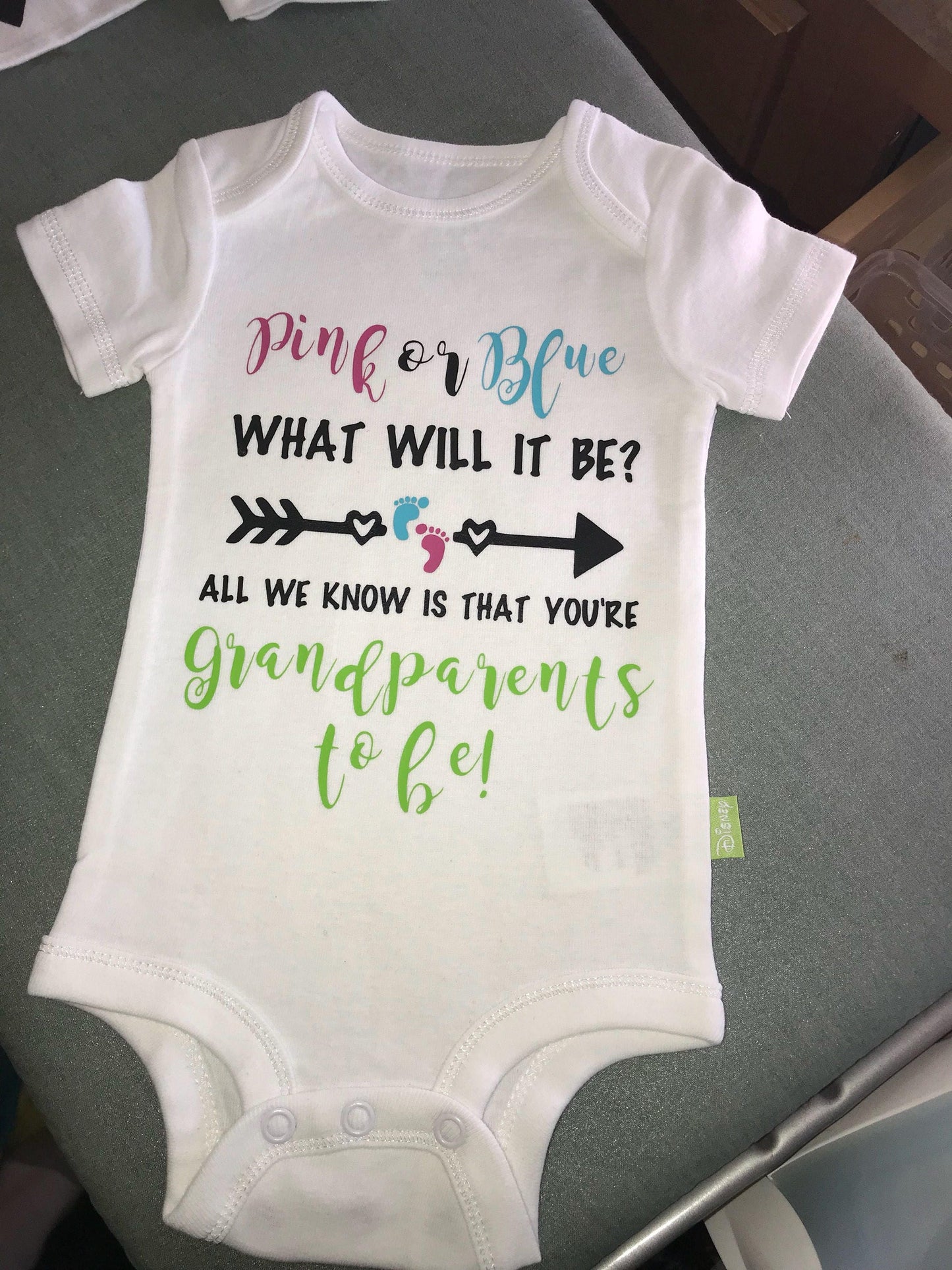 Baby announcement onesies